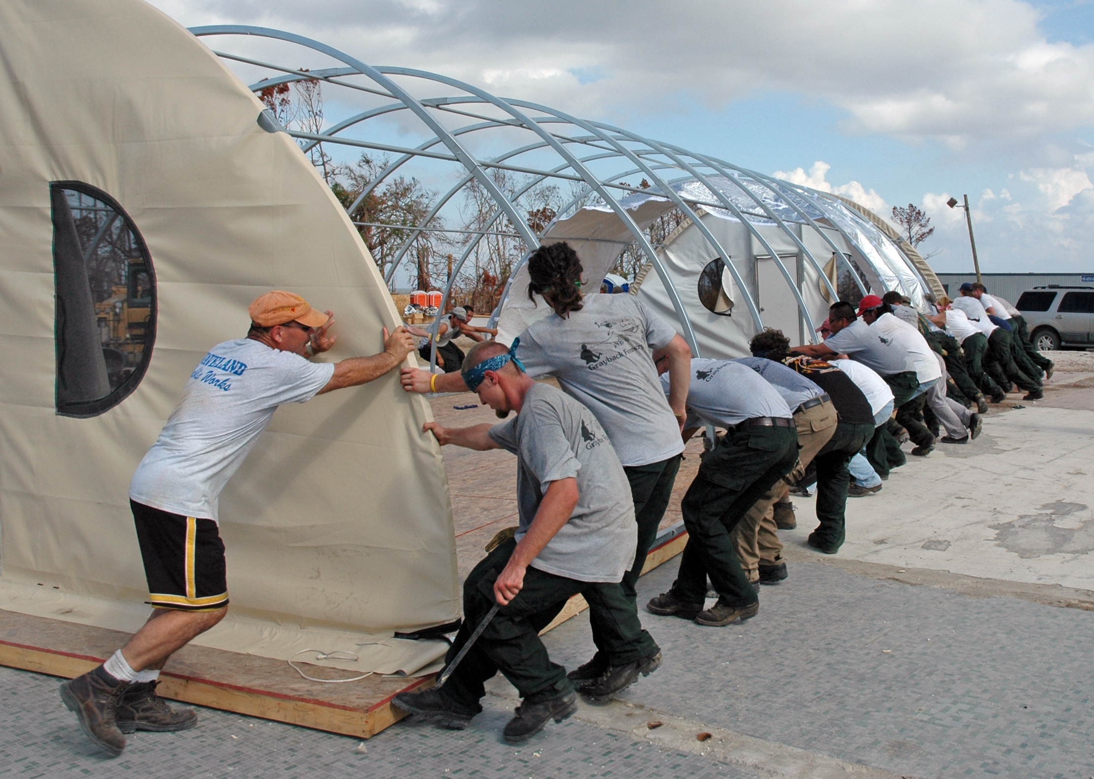 richard-hotes-and-volunteers-with-hotes-foundation-waveland-mississippi-hurricane-katrina-moving-disaster-relief-shelter-1 richard-hotes-and-volunteers-with-hotes-foundation-waveland-mississippi-hurricane-katrina-moving-disaster-relief-shelter-1