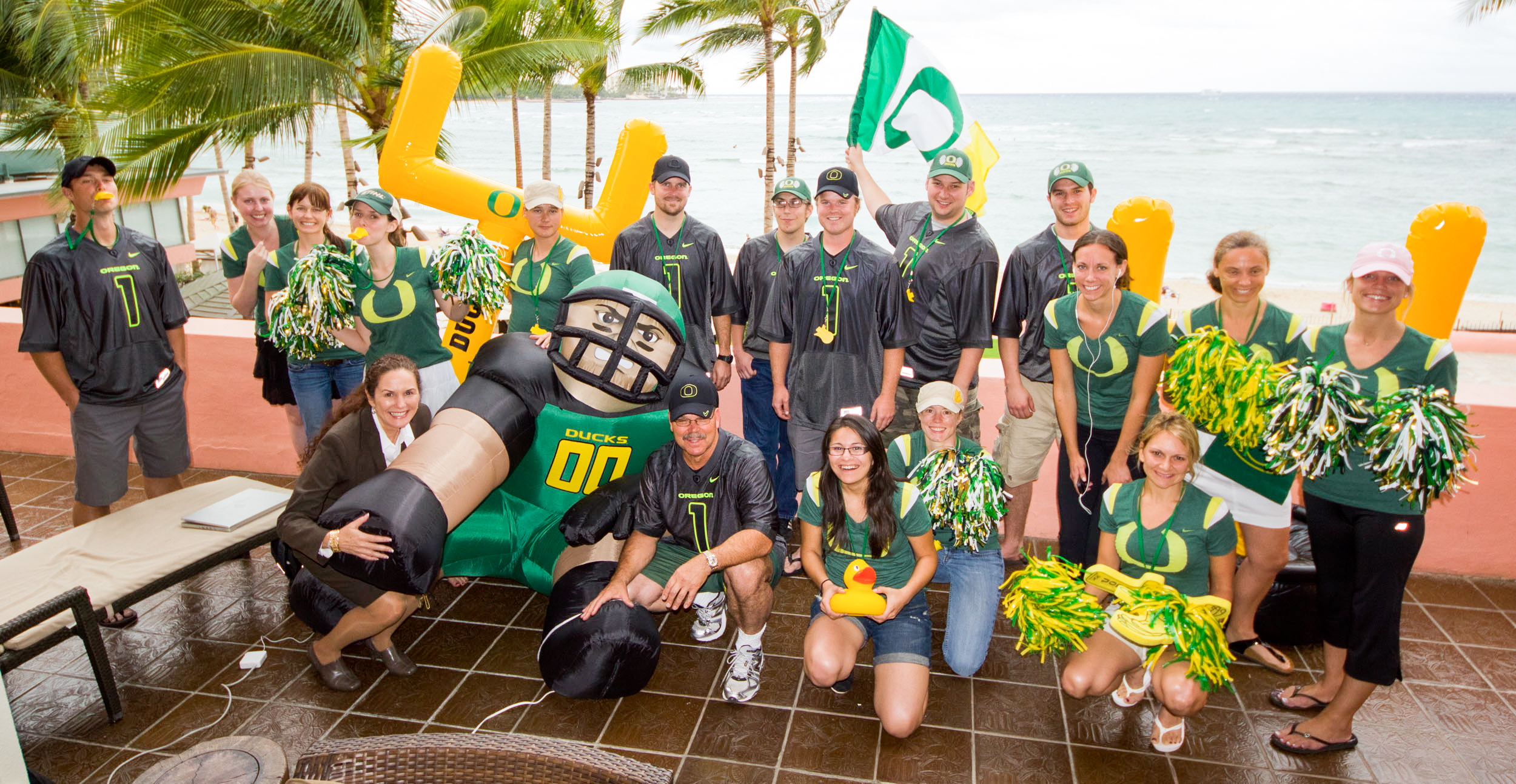 richard-hotes-with-employees-of-aks-industries-in-hawaii-for-ducks-game-1 richard-hotes-with-employees-of-aks-industries-in-hawaii-for-ducks-game-1